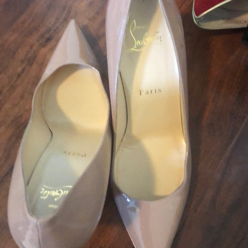 Louboutins, beige low heeled work shoes